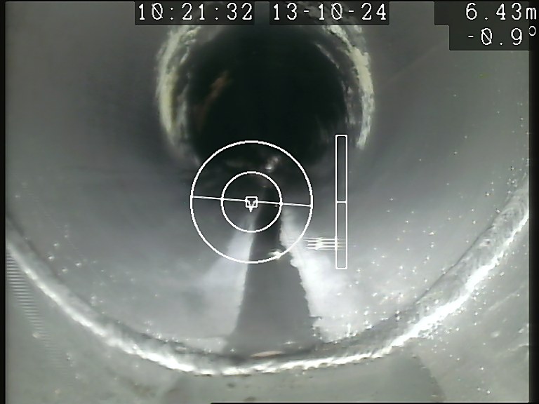 Clean concrete sewer line 6.43 m into an ARPCO inspection run, the crawler's sight ring and the recorded distance across the top of the frame