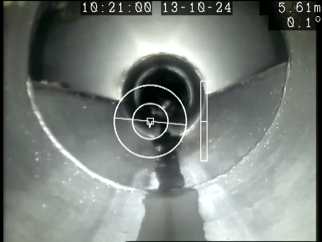 The mouth of a concrete pipe at a change of section, recorded at 5.61 metres into an ARPCO inspection run.